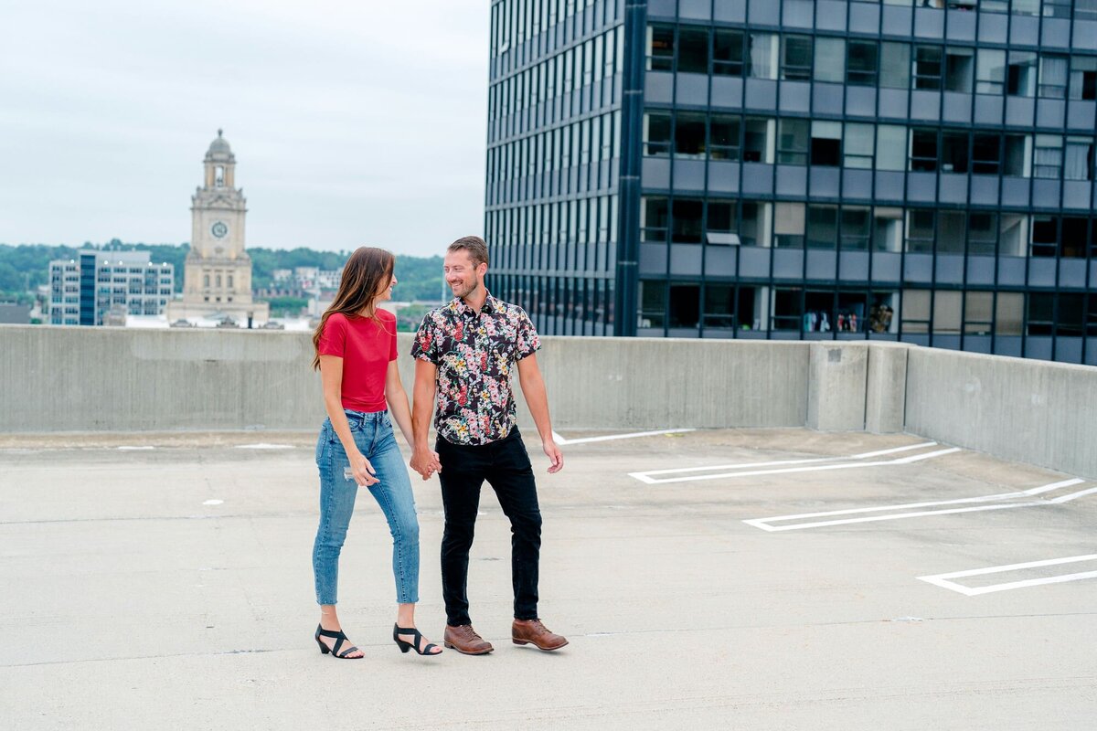 man-girl-smiling-embrace-rooftop-engagement