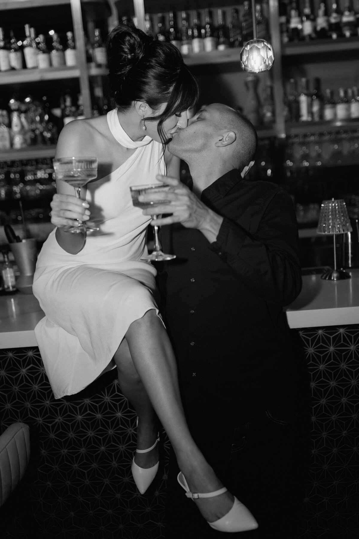 A romantic black and white moment from a rehearsal dinner, showcasing cinematic wedding photography with intimate storytelling.A romantic black and white moment from a rehearsal dinner, showcasing cinematic wedding photography with intimate storytelling.