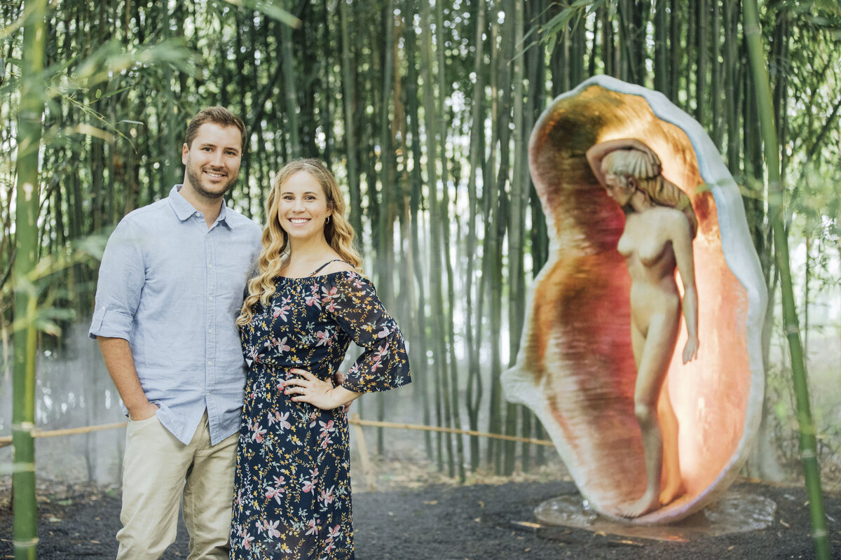 Couple by bamboo during engagement photo at Grounds for Sculpture in Hamilton Township Mercer County New Jersey