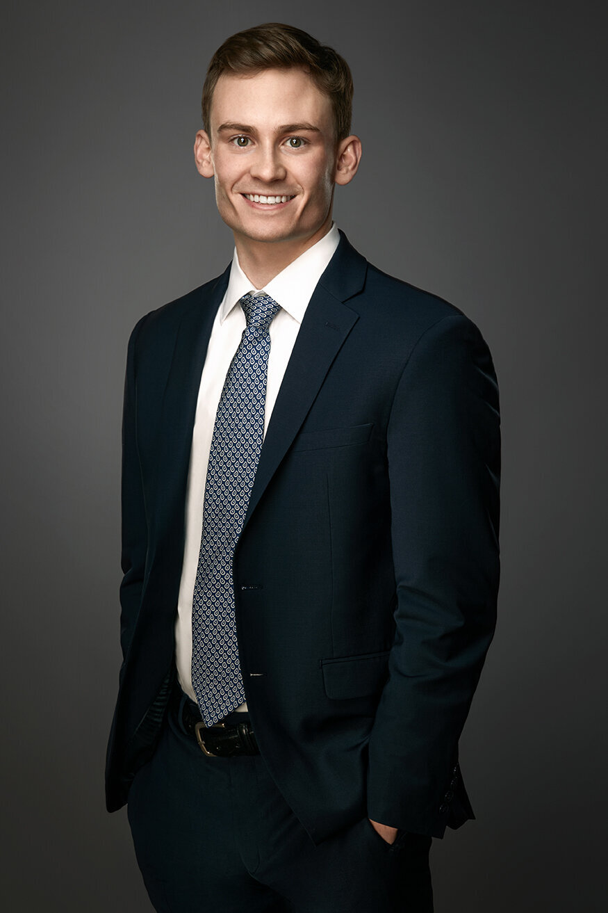 Elegant portrait of Peter Wyeth in a classic suit, exuding professionalism, captured by Ylva Erevall.