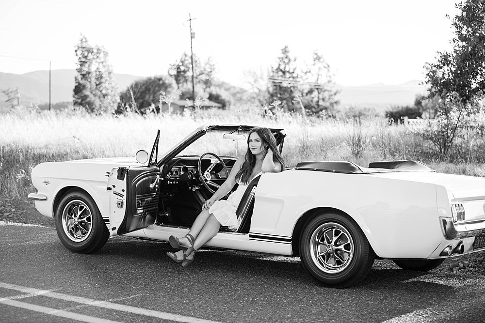 vintage convertible car with senior girl