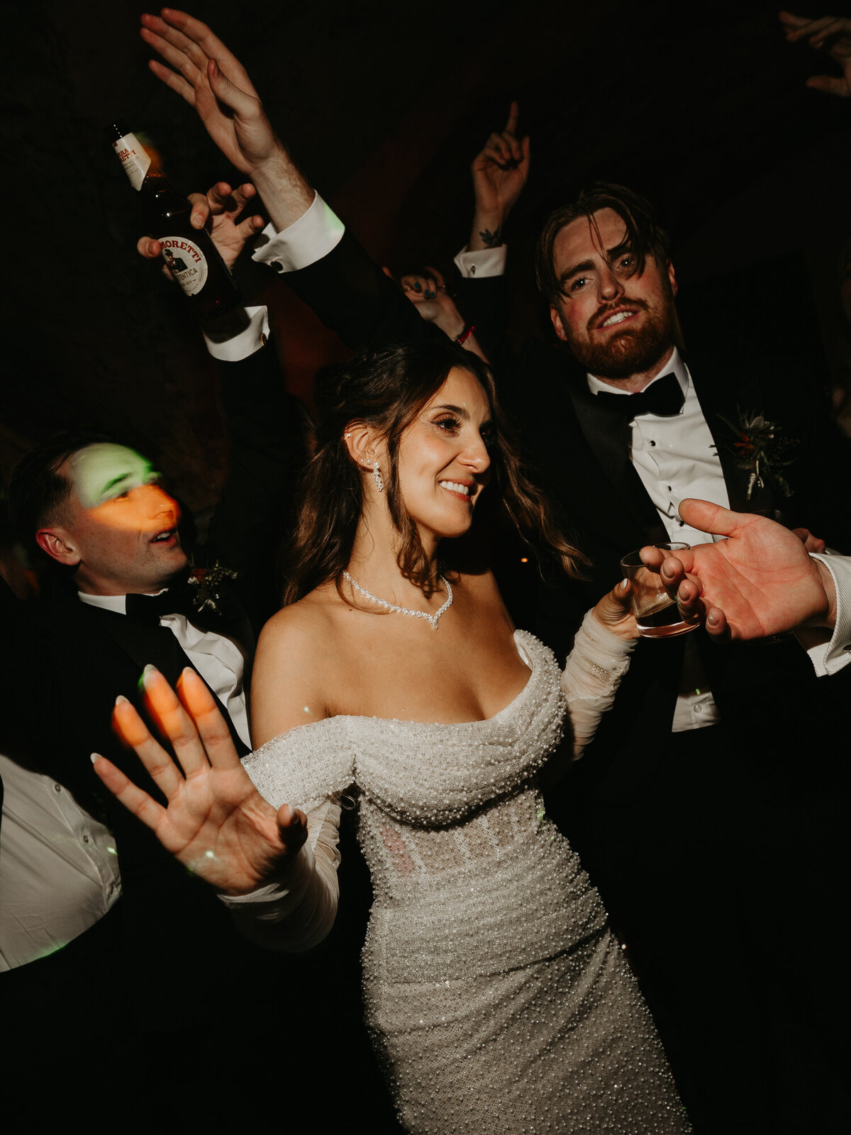 Wedding guests dance with the Bride and Groom at their wedding at The Mount Without. 