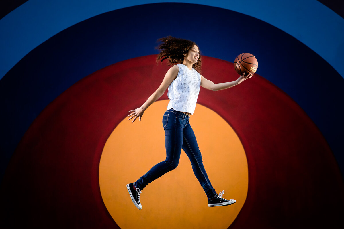 portrait-senior-highschool-sports-color-jumping-basketball