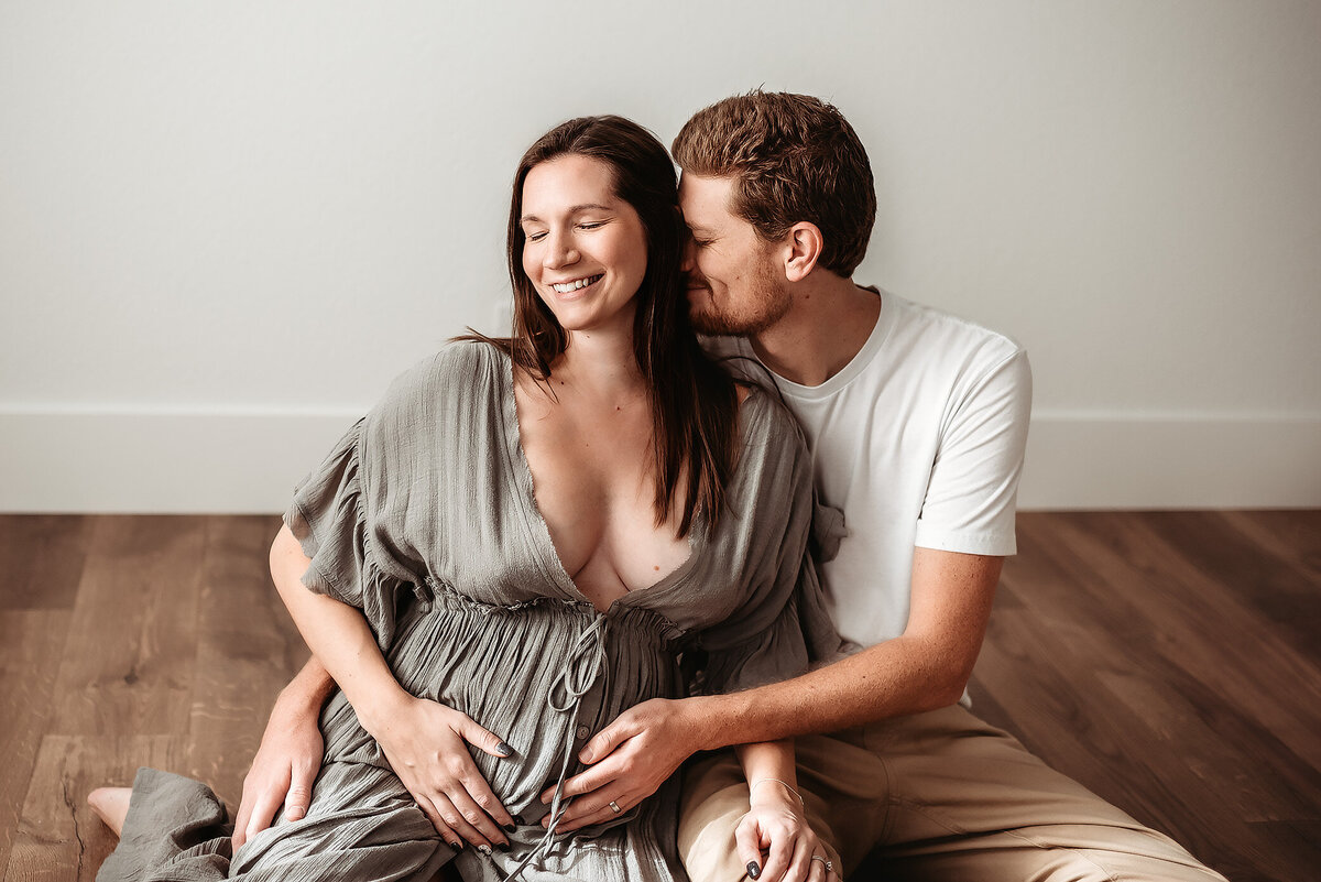 maternity mother with husband in denver photographer studio