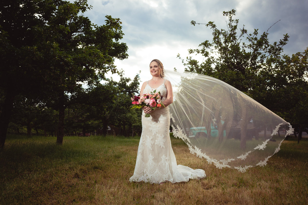 bride in orchard at merridale cobble hill