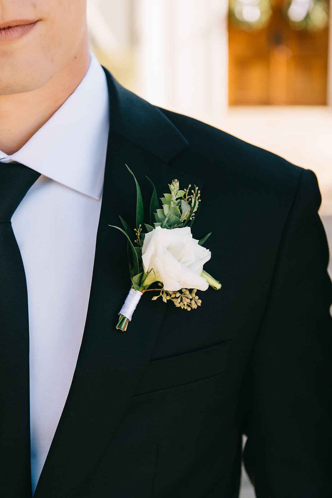 White and green boutonniere designed by Abby Grace Florals at Saluda SC wedding