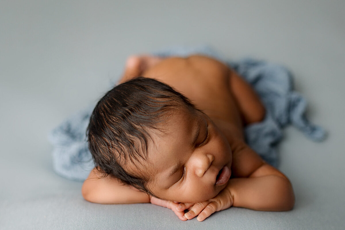 sweet baby boy posed in atlanta newborn studio