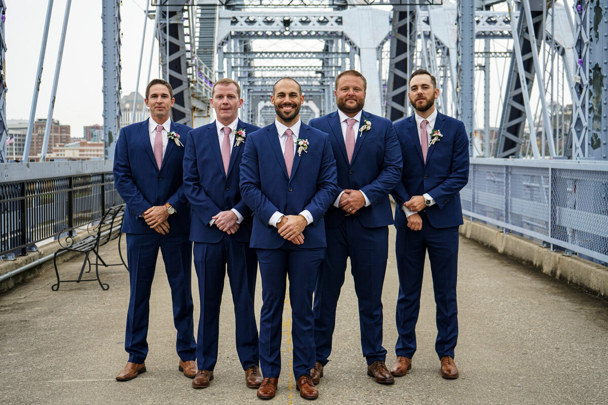 Groom-and-Groomsmen-on-purple-people-bridge
