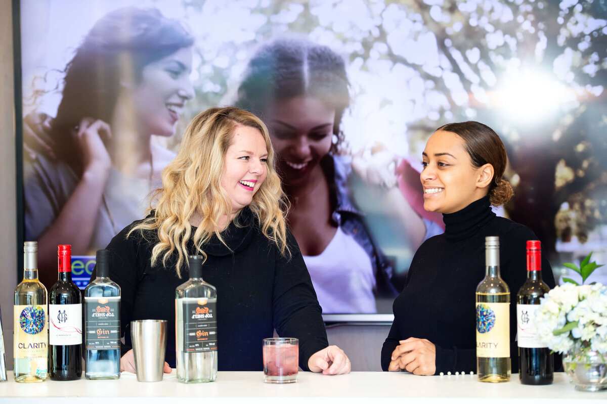 Ottawa event photos of the bar staff smiling and waiting to serve at the eQ Groundbreaking event.  Captured by JEMMAN Photography COMMERCIAL