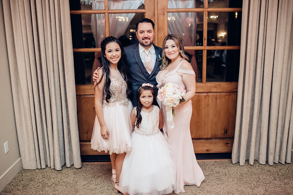Wedding Photograph Of Man in Suit With Three Girls In Dresses Los Angeles