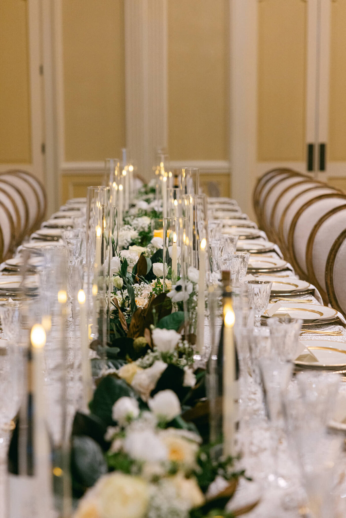 A wedding day photo showing off the tables in the reception hall for the wedding