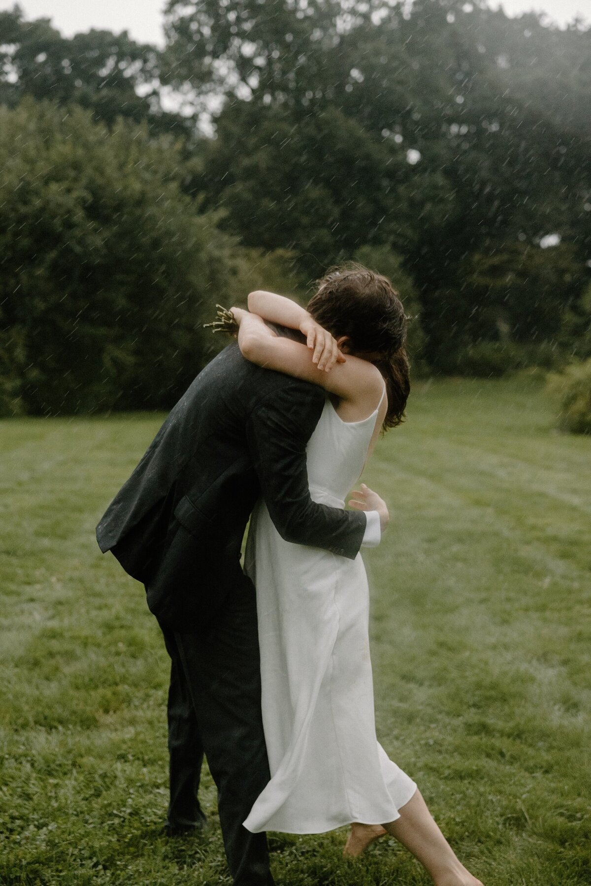 couple embracing in the rain