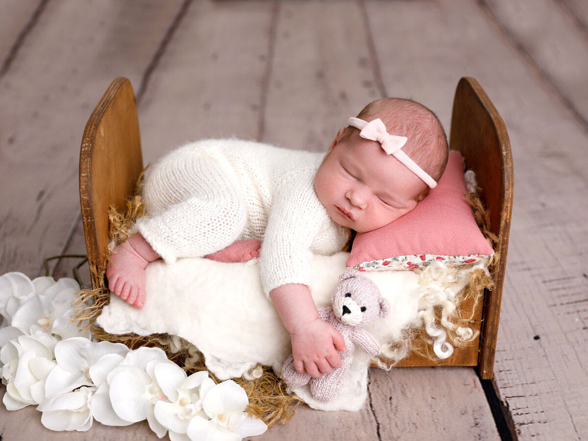 Newborn-photography-session-newborn-in-little-bed-prop-newborn-photography-pose-with--photo-taken-by-Janina-Botha-photographer-in-Oakville-Ontario