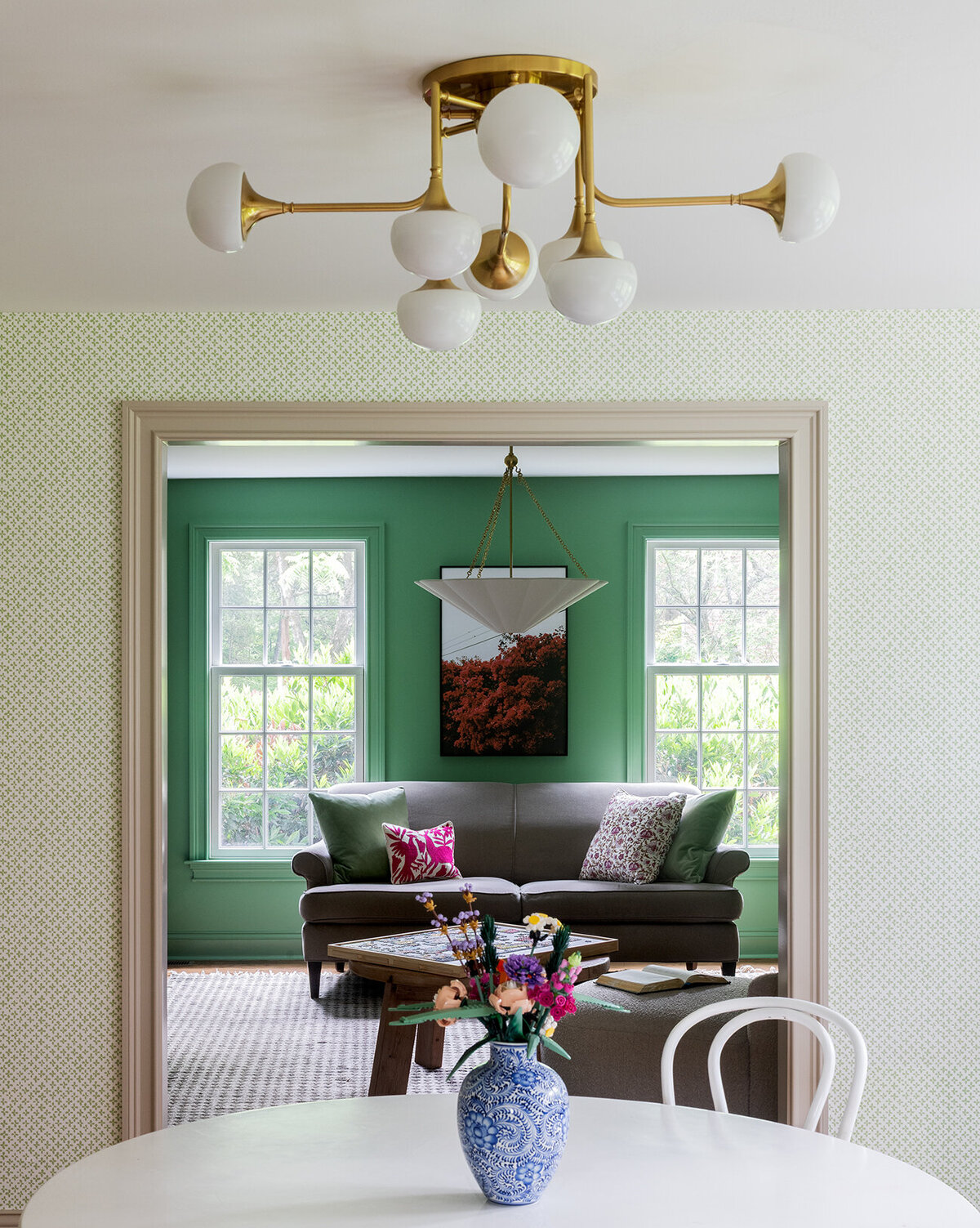study room entryway to green living room