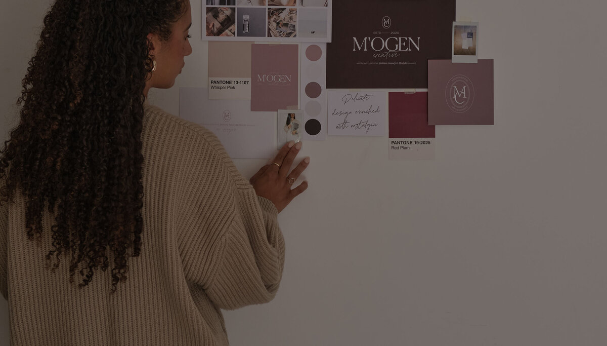 Woman standing in front of a moodboard on a wall