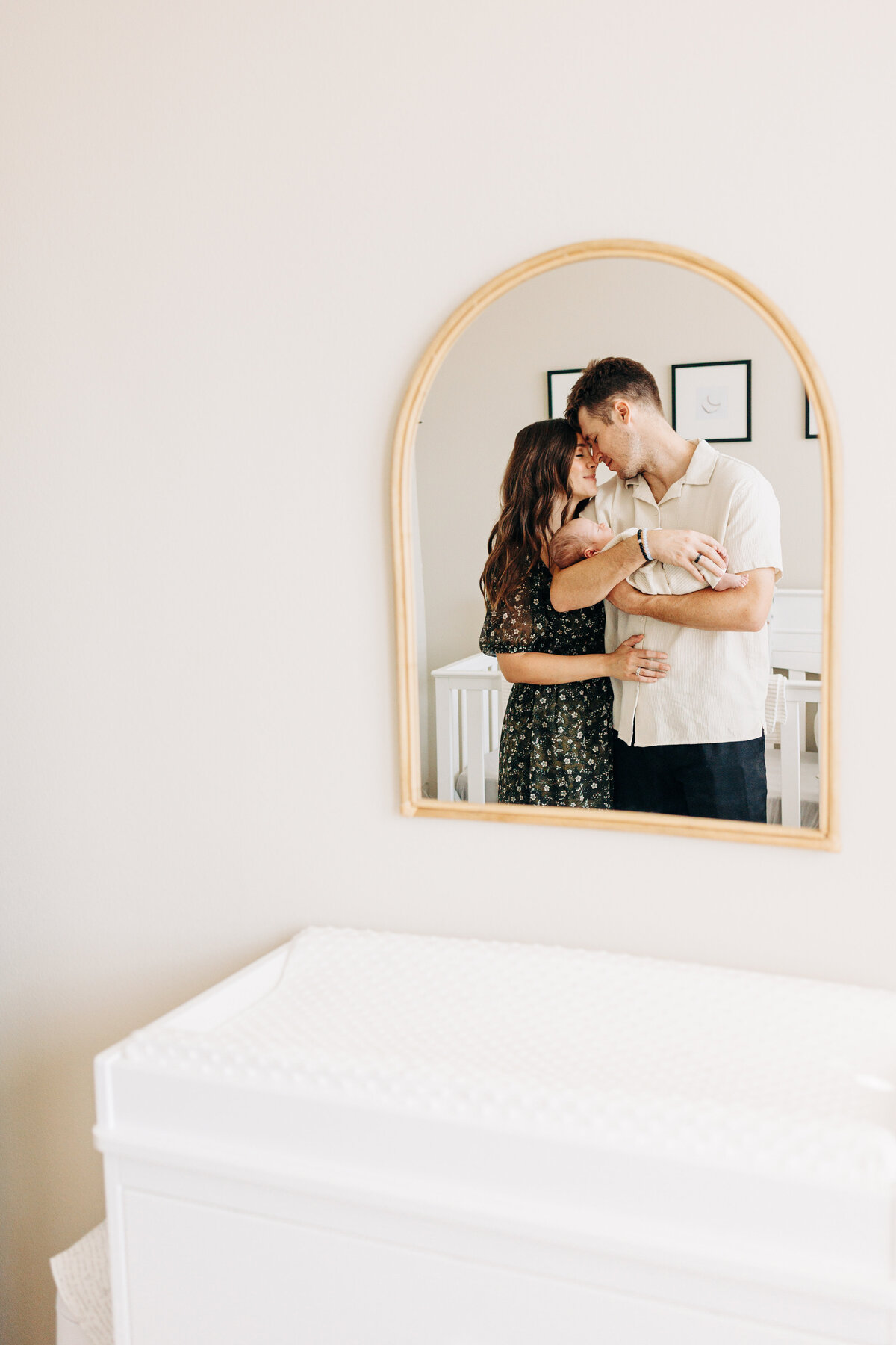 family of three during their in home newborn session