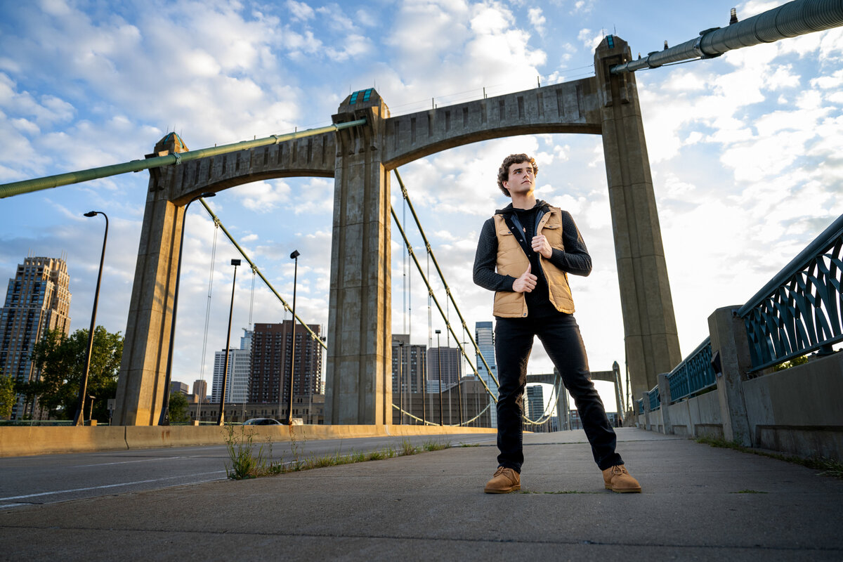 Princeton Minnesota high school senior  photo of boy on city bridge