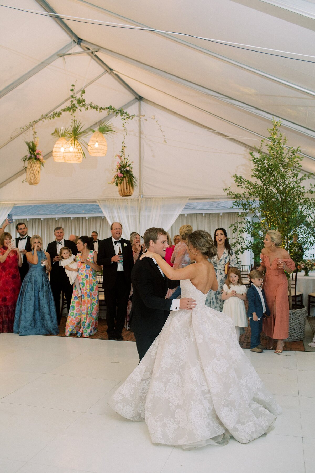Bride and groom have their first dance at their wedding reception