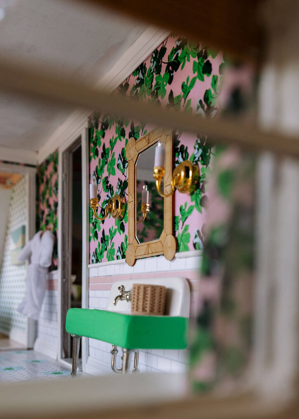 oyster creek studios petite palm beach dollhouse green and pink wallpaper with green sink and brown accent mirror