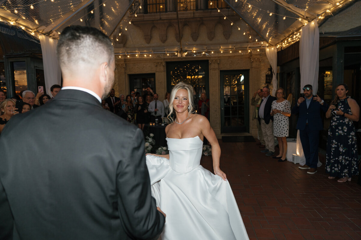 Bride and Groom sharing their first dance together at wedding reception by film wedding photographer Shelby Ann Photos