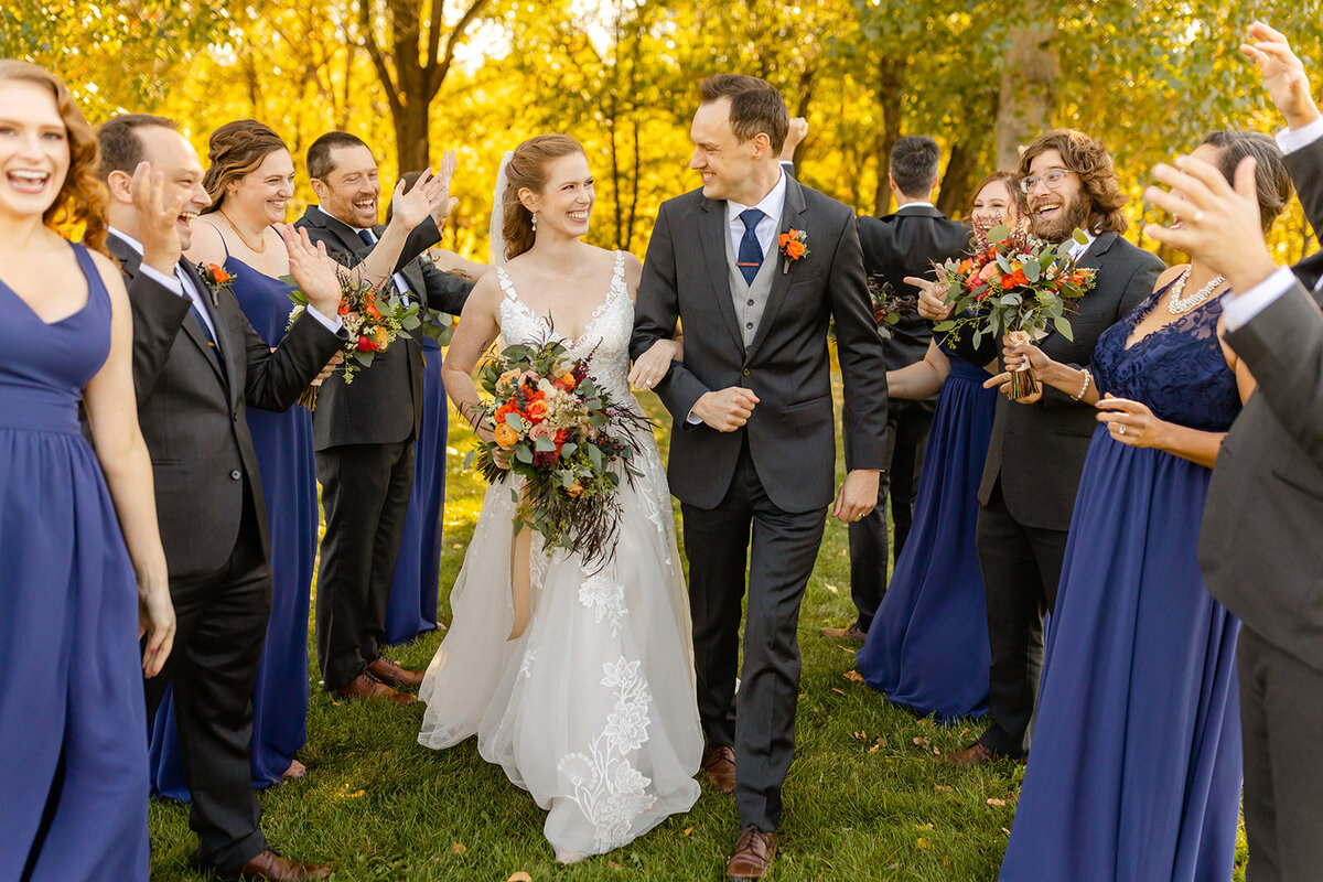 bride-groom-wedding-party-cheering-fall-autumn