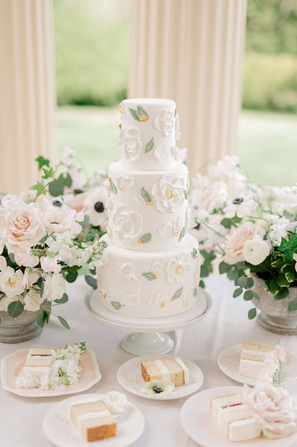 Wedding Photography of creme and blush three tier wedding cake