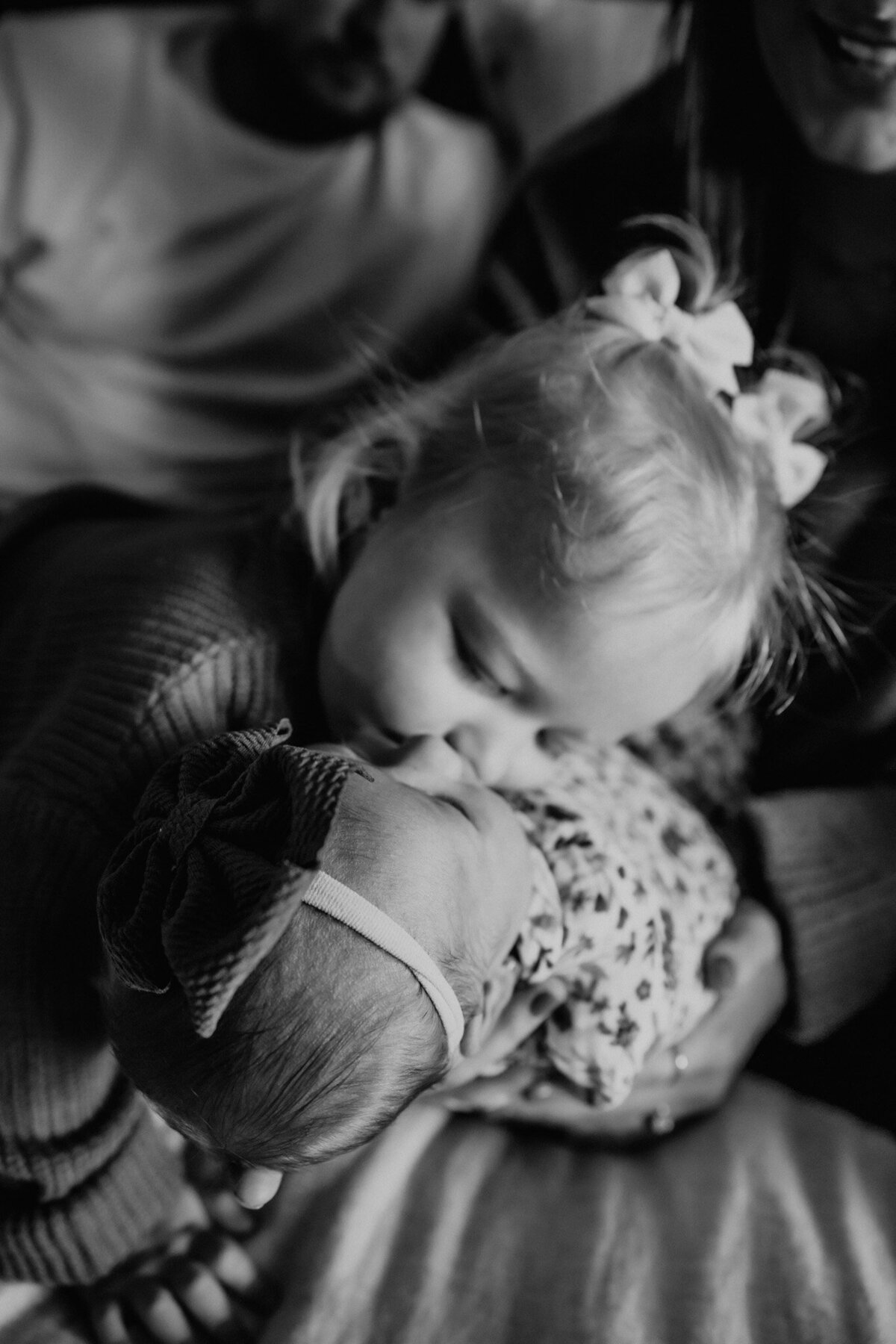 KISSING NEW BABY