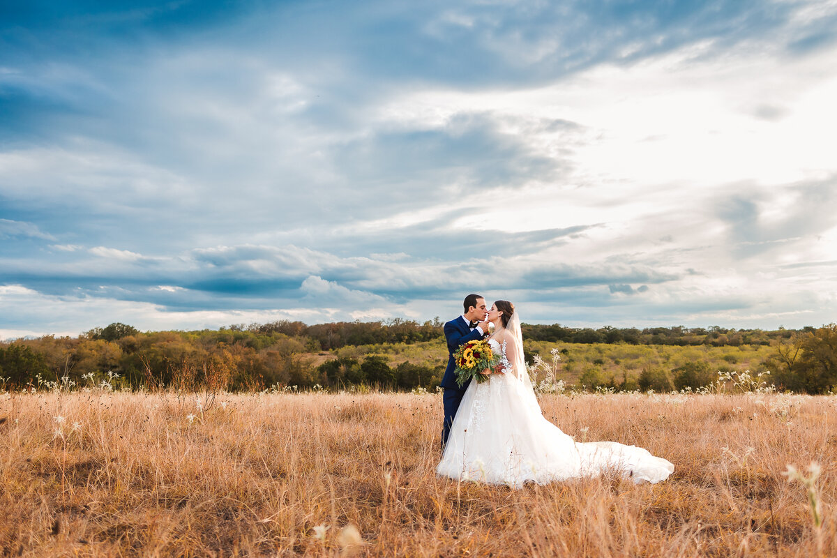 Dive into a vibrant summer celebration at Harper Hill Ranch. Sunflowers, open fields, and an upbeat dance party await your unforgettable wedding day!