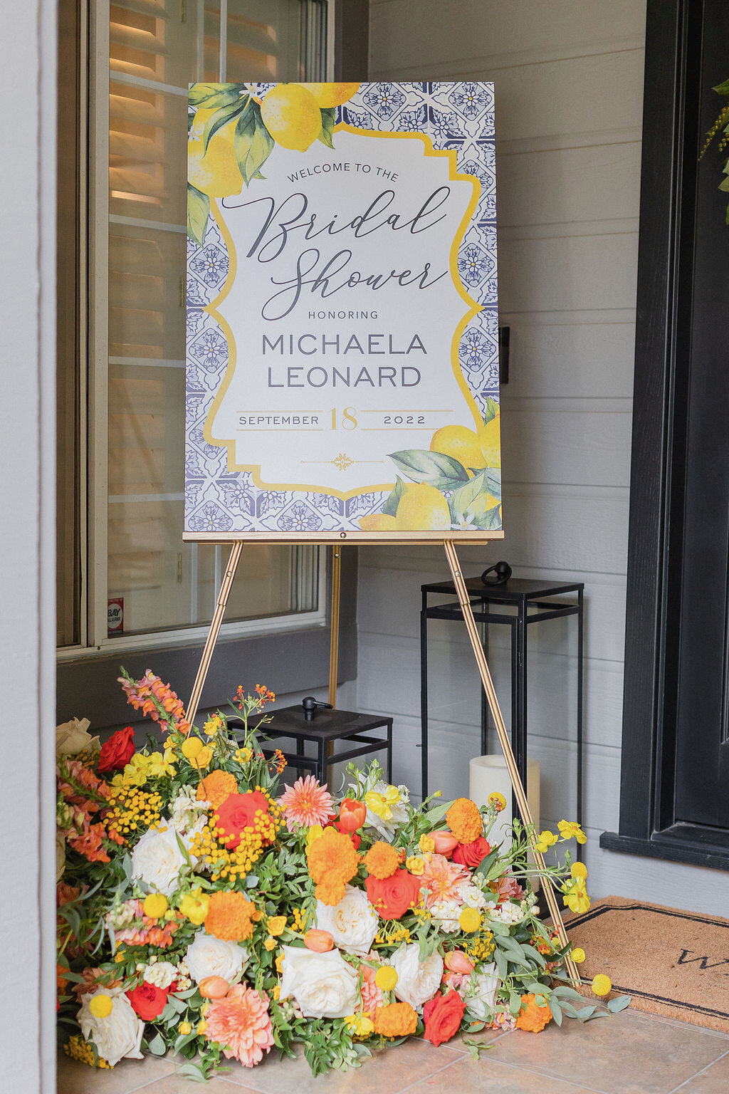 welcome sign, ground arrangement, yellow, orange, citrus tones