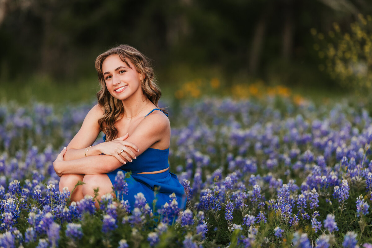 high-school-senior-in-bluebonnets