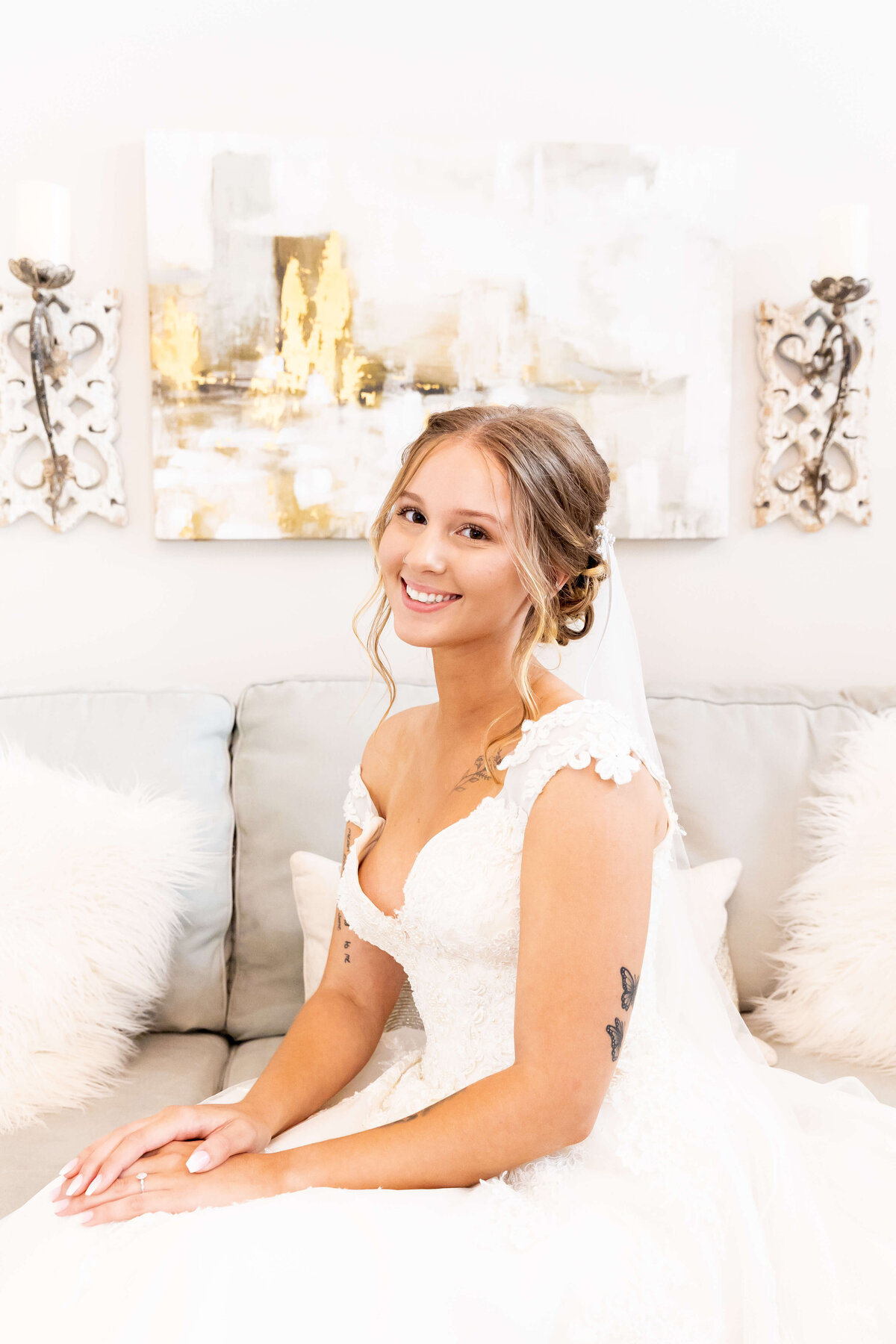 Bride sitting down wearing lace dress at Ruby Cora Wedding, Clarksville, TN