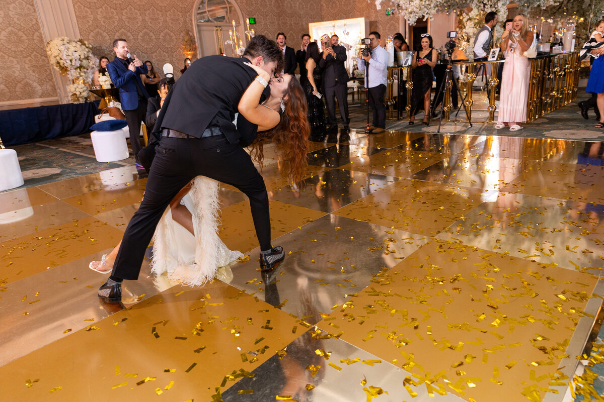 Couple dancing and kissing  in the ballroom at Four seasons beverly hills