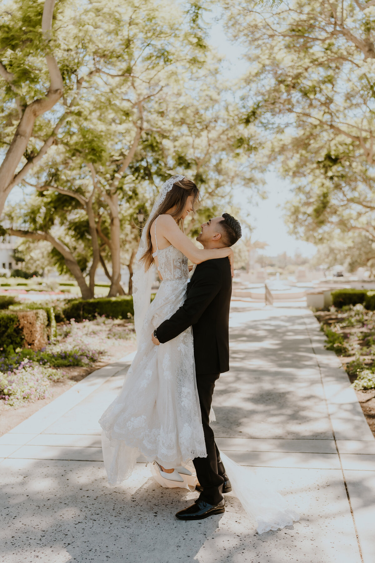 Temecula, California Wedding photographer Yescphotography Bride and Groom embracing each other