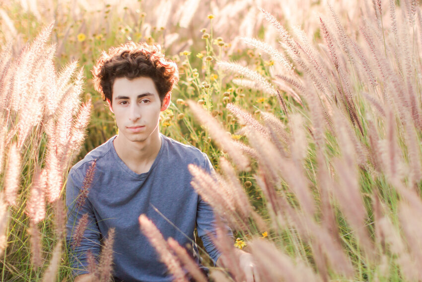 senior-boy-in-glowing-grasses