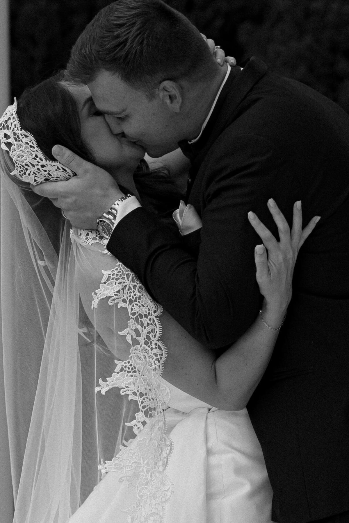 First kiss of bride and groom at La Casa Toscana