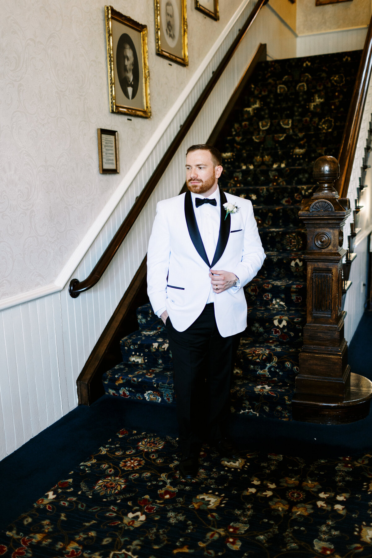 Groom posing for Minneapolis wedding photographer