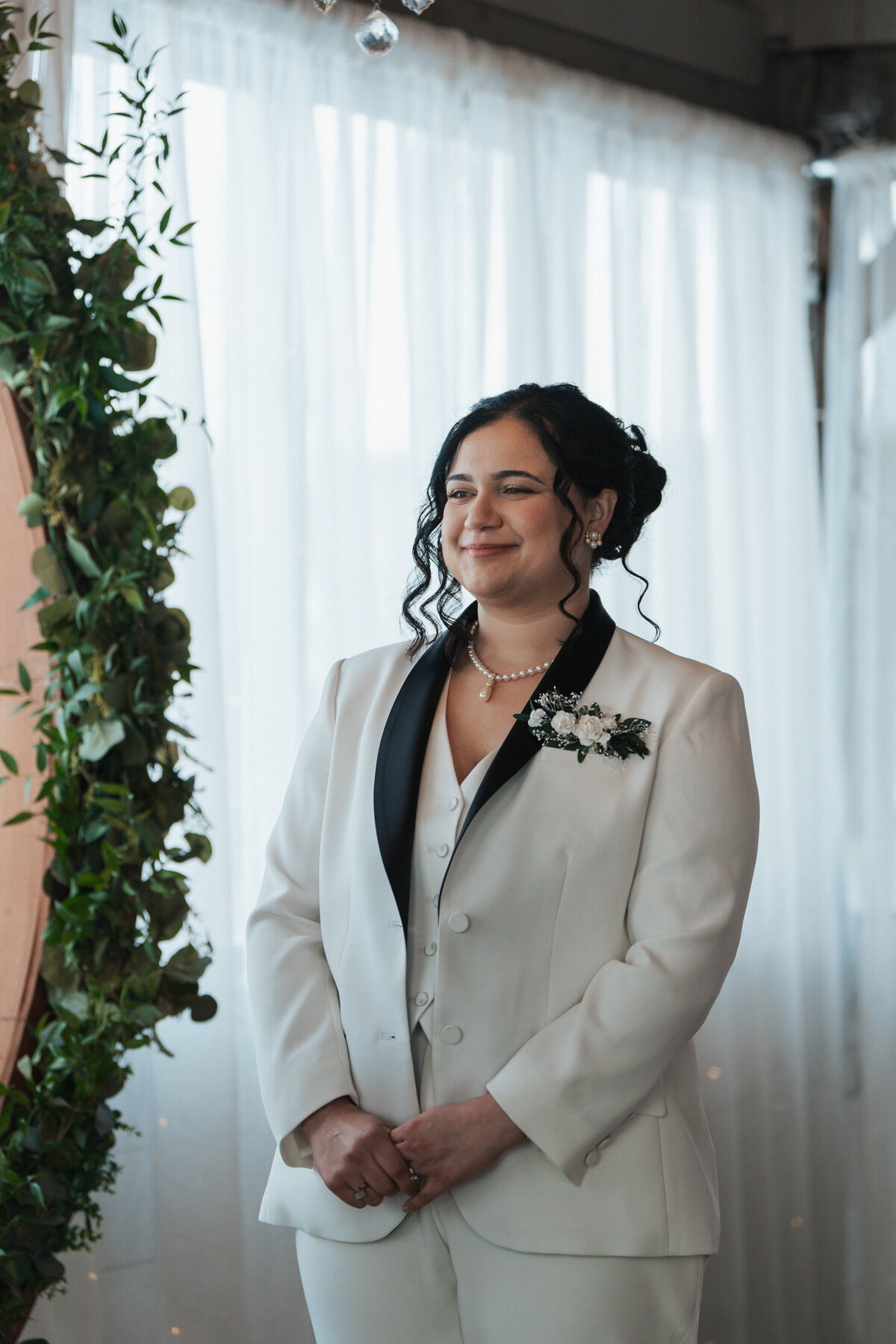 Woman smiles softly at the altar of her Tennessee elopement 