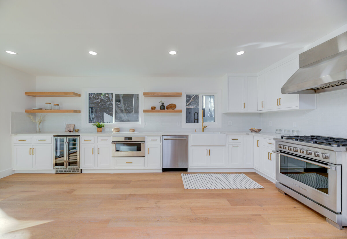 white-kitchen-gold-hardware-open-shelving-large-range