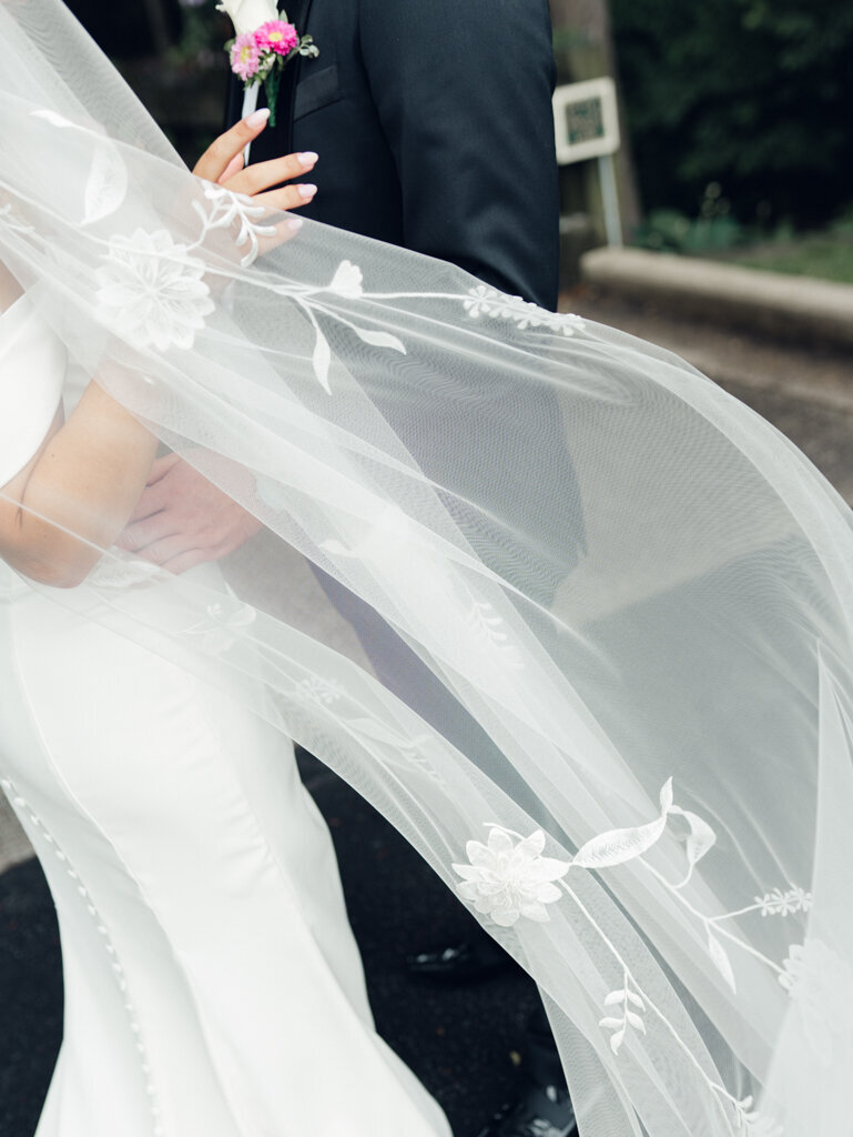 bride veil blowing in the breeze taken by washington dc wedding photographer Nicole Simensky