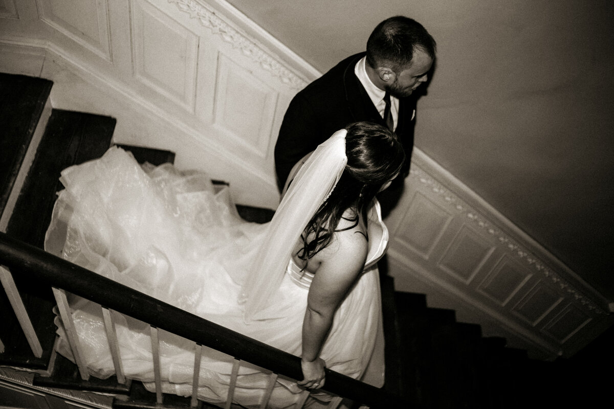 Salem VA wedding and Elopement photographer earthy and moody Charleigh Roberts Photography artsy earthy moody virginia roanoke va east coast fincastle daleville botetourt kyle house stairs bride groom editorial