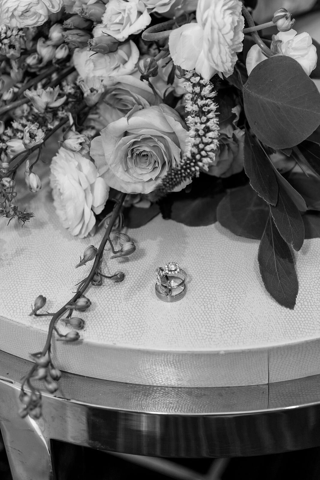 detail photos of the bride and grooms rings