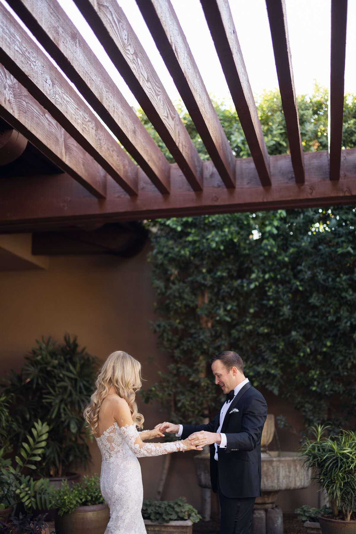 Candid moment of bride and groom at Paradise Valley Country Club