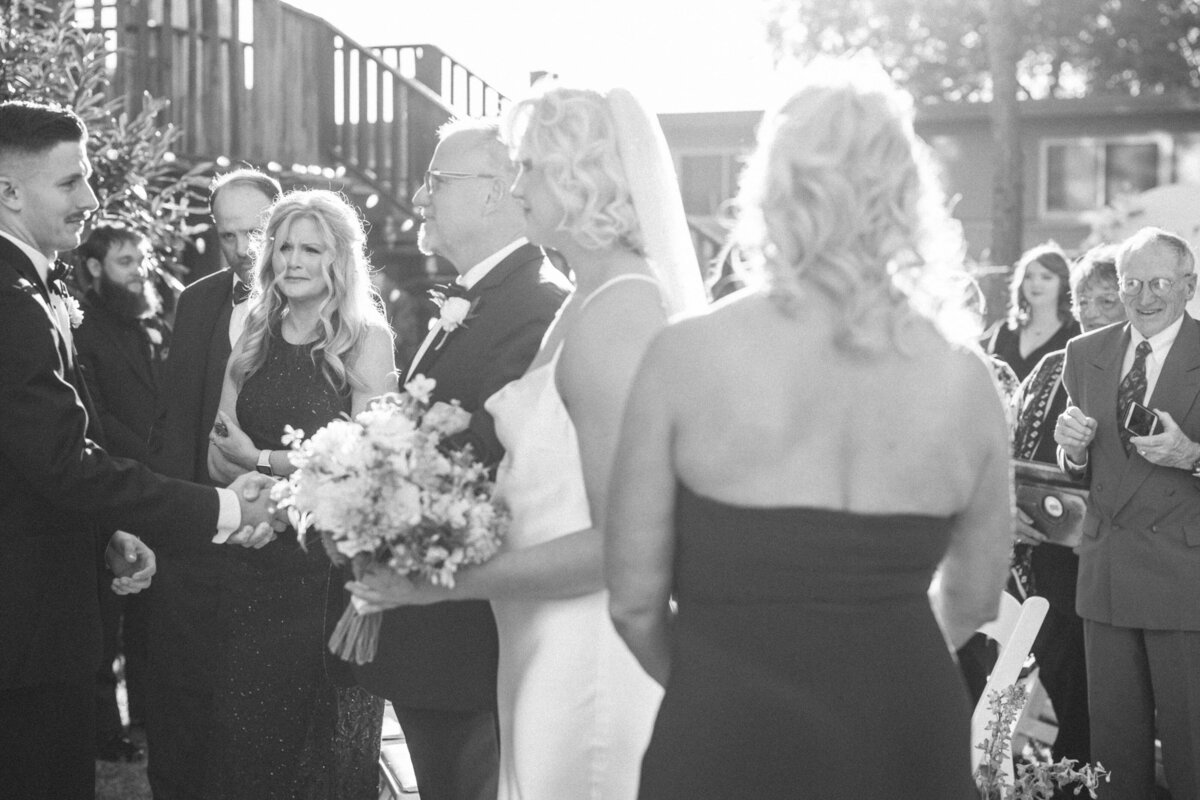 emotional-mother-of-groom-watching-during-ceremony