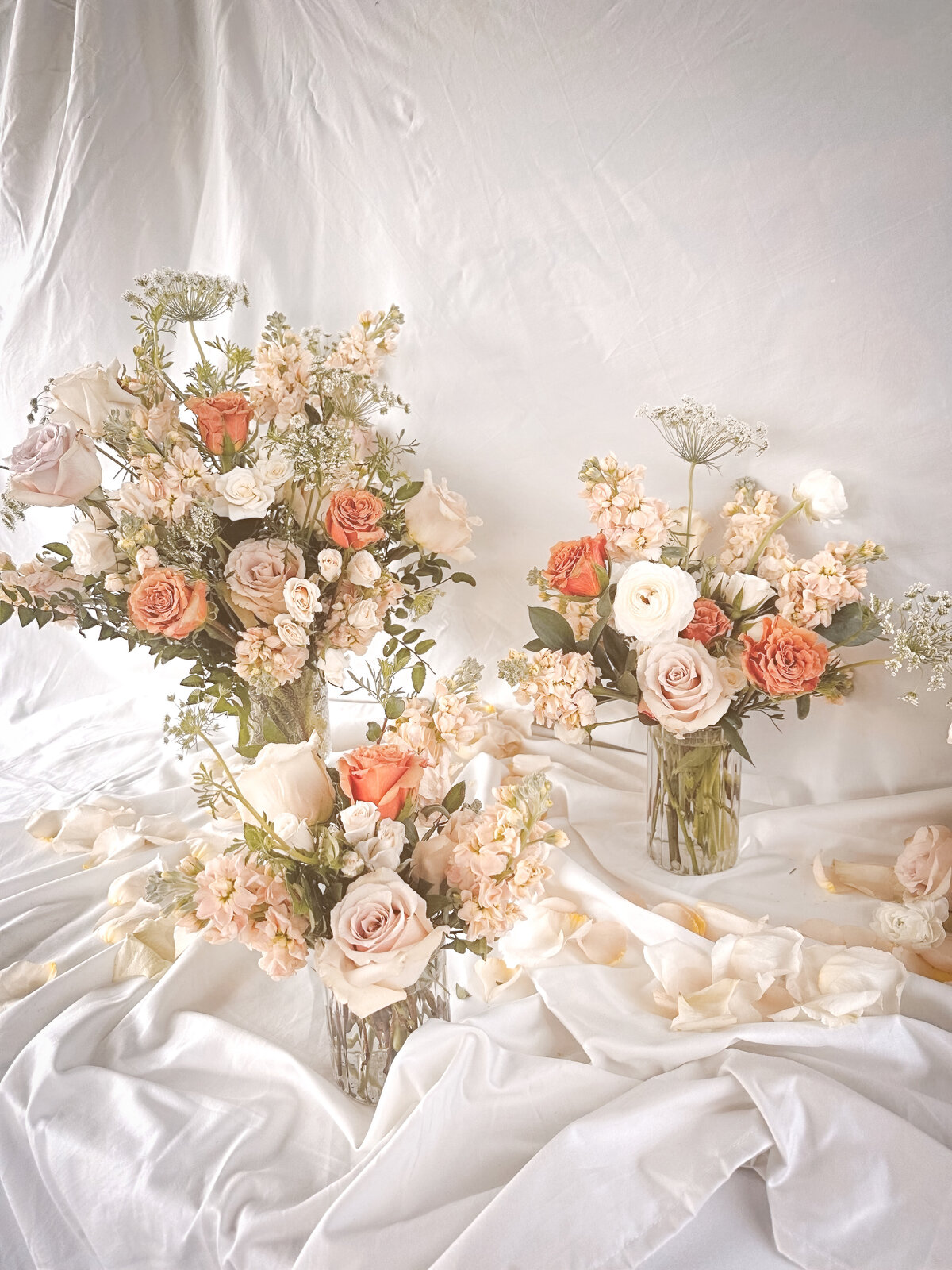 three arrangements couple getting married using a Garden-inspired bridal bouquet by My Beloved Floral in Meridian, Idaho