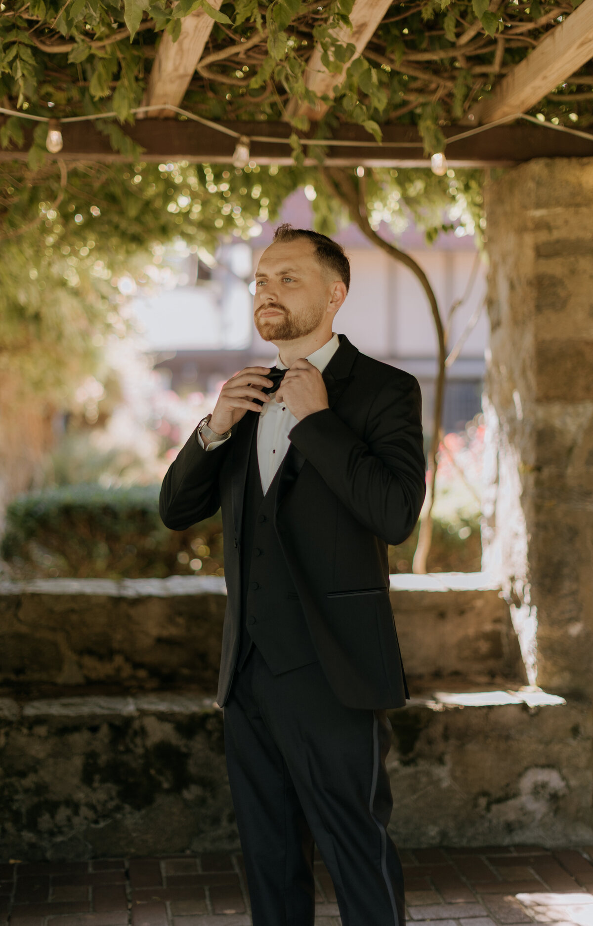 groom-getting-ready-for-first-look-saint-clements-castle