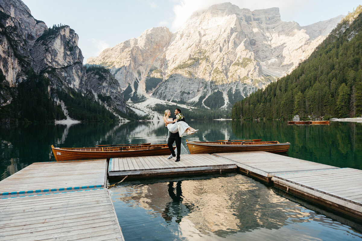 Scenic view of Lago di Braies docks surrounded by mountains