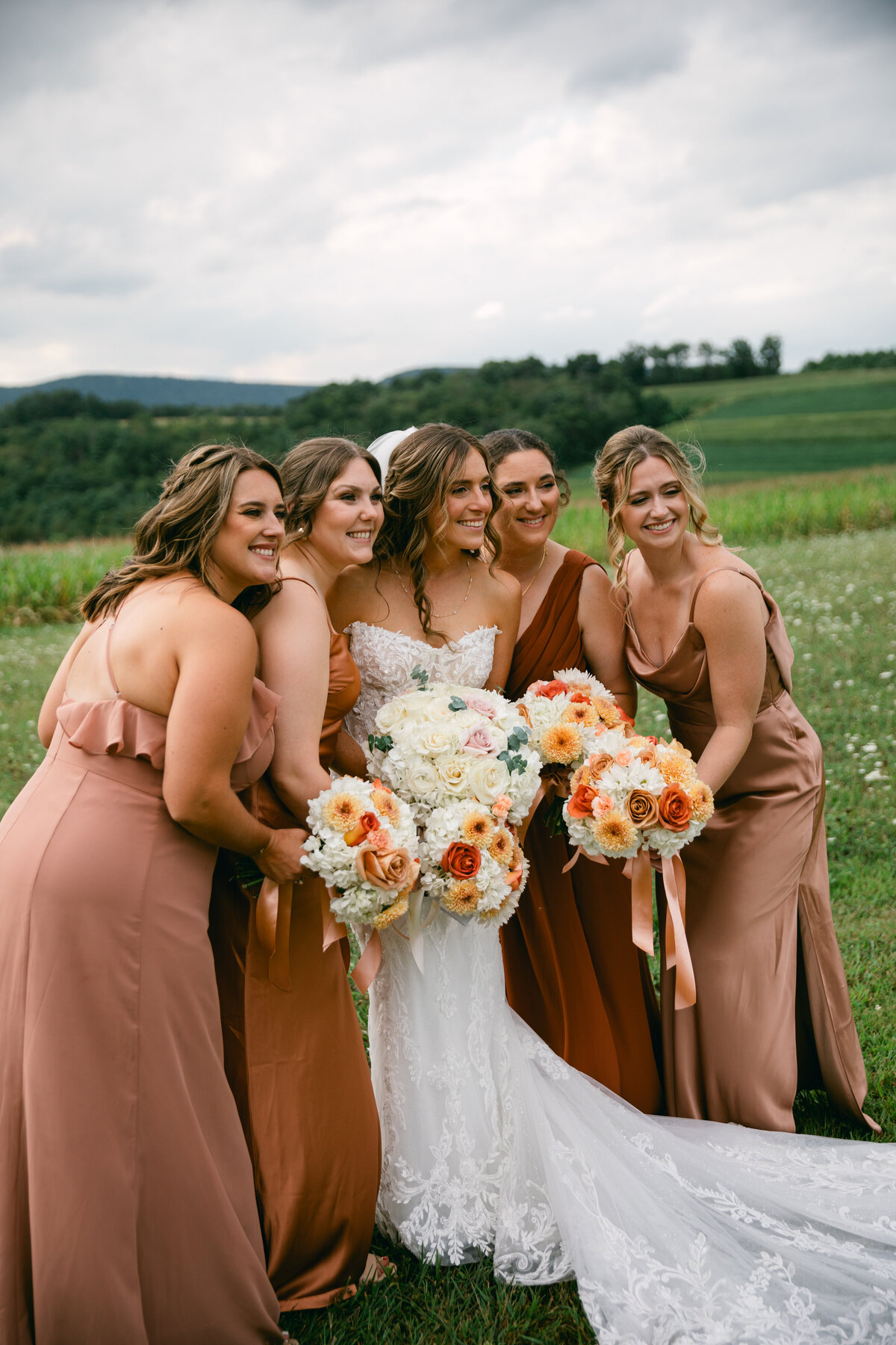 bride-with-bridesmaids-bouquet-closeup