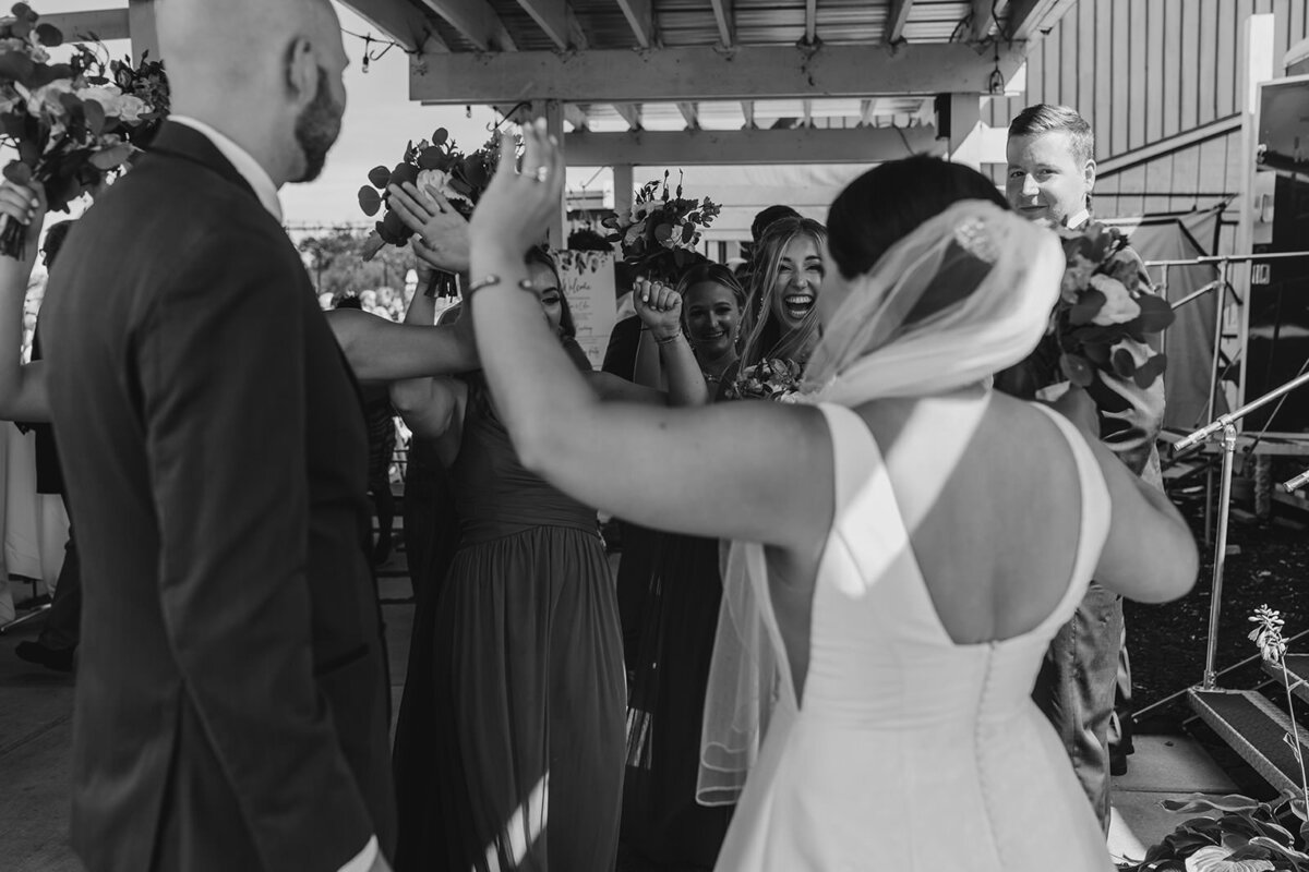 Newlyweds celebrating with their wedding guests