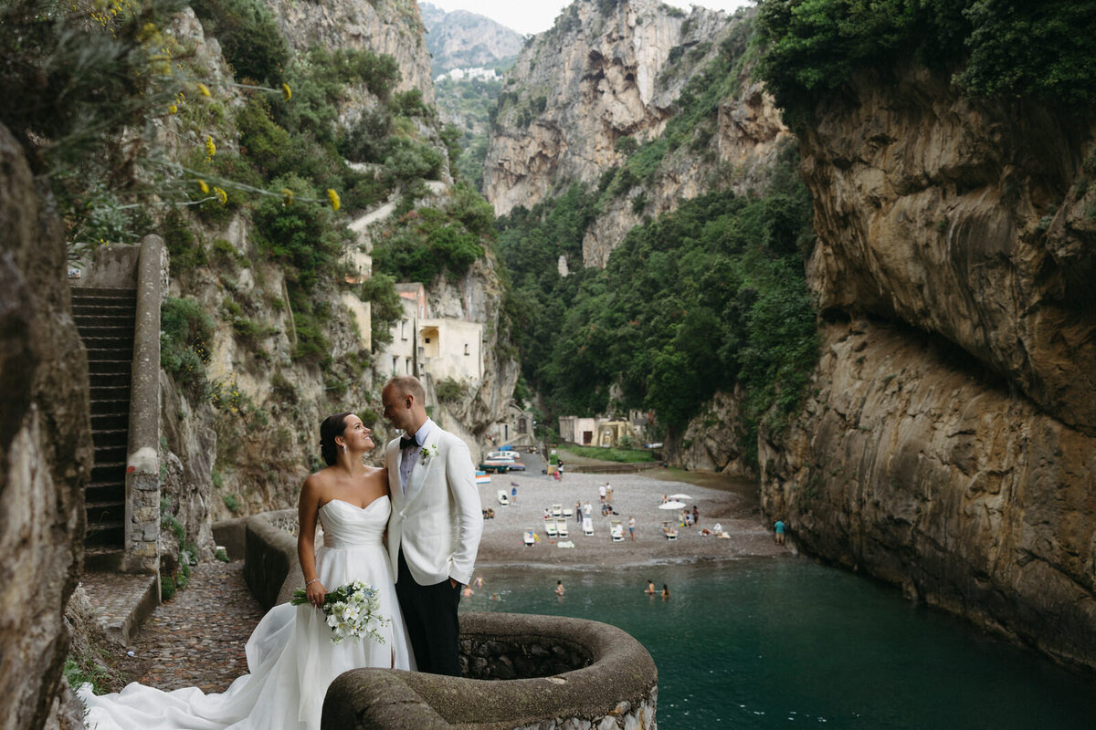 Bride and Groom gazing into each other's eyes at Fiordo Di Furore on the Amalfi Coast in Italy for their summer wedding day, documented by Andrea-Marie Photography 