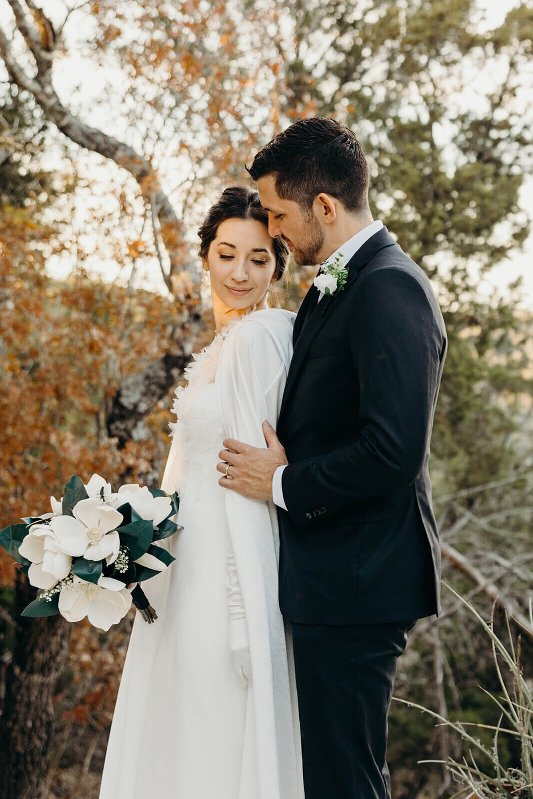 Classic wedding look featuring a bride with natural bridal makeup and an updo hairstyle, perfect for outdoor ceremonies in Austin, TX